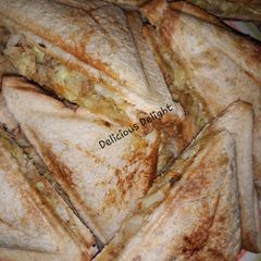 A picture of Sardines n veggies sandwich.