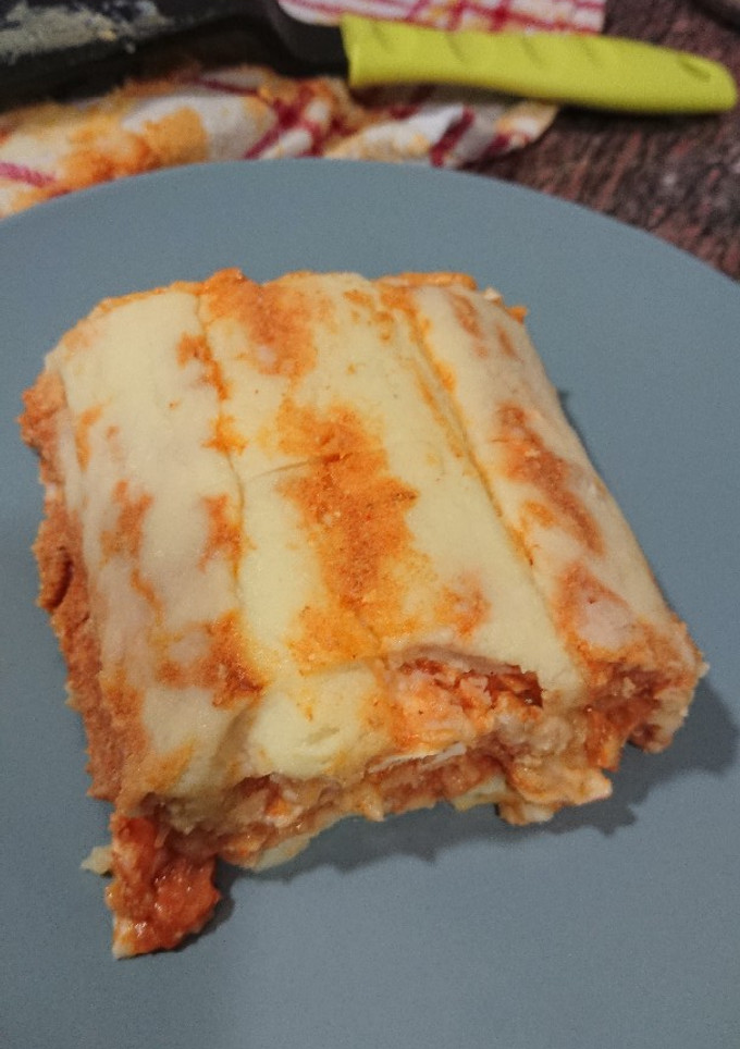 Una foto de Pastel de carne y huevo duro