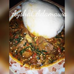 A picture of Tuwon shinkafa and okro soup.