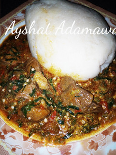 A picture of Tuwon shinkafa and okro soup.