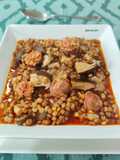 Lentejas con choricitos picantones y setas shiitake