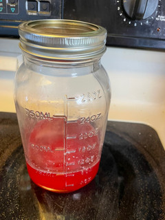 A picture of Strawberry simple syrup.