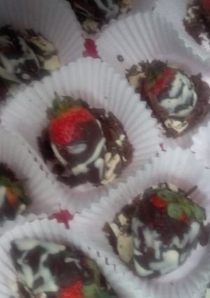 A picture of Chocolate coated strawberries.
