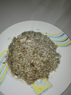 Una foto de Arroz con chipirones