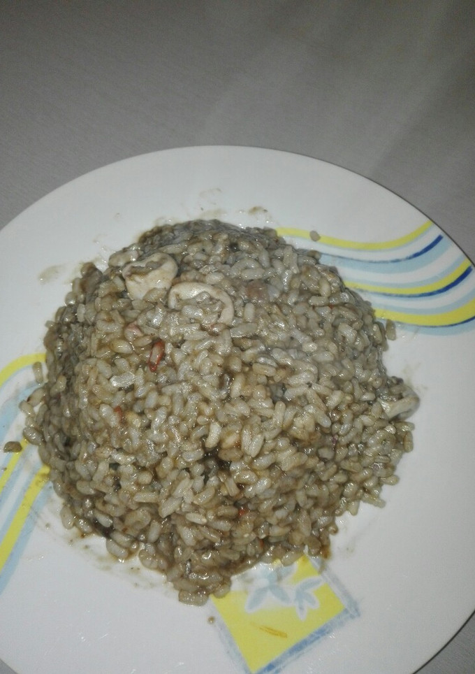 Una foto de Arroz con chipirones