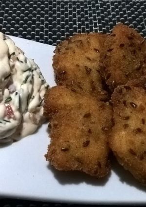 Una foto de Nuggets de pollo crocantes con domo de queso saborizado!