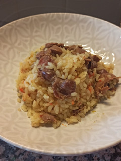 Una foto de Arroz con mollejas de pollo