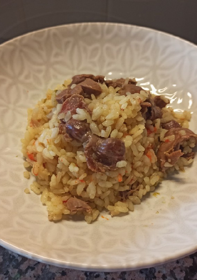Una foto de Arroz con mollejas de pollo