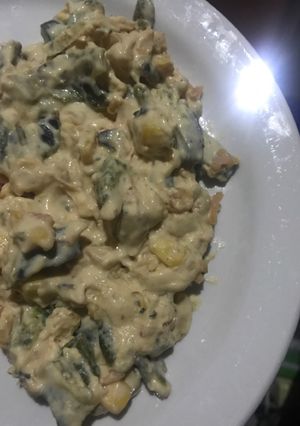 Una foto de Rajas con elote y pollo