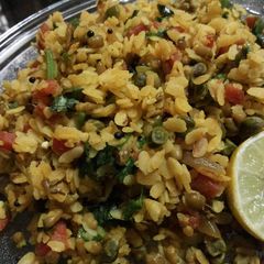 A picture of Moong daal poha with veggies.