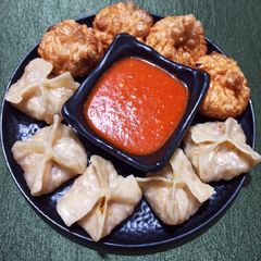 A picture of Veg momos fried momos.