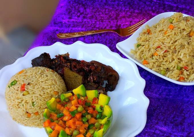 Coconut rice, avocado salad and fried goat meat