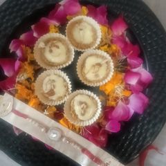 A picture of Mini Ghevar with Custard.