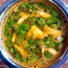 A picture of Pineapple rasam.