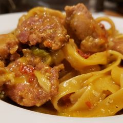 A picture of Chicken and Sausage Cajun Pasta.