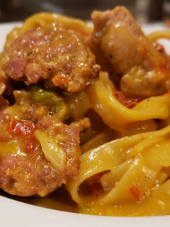 A picture of Chicken and Sausage Cajun Pasta.