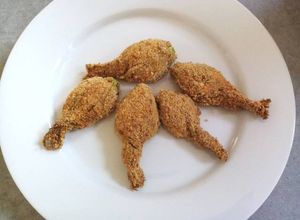 Foto di Fiori di zucca ripieni e impanati in friggitrice ad aria