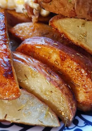 Una foto de Papas marinadas al horno