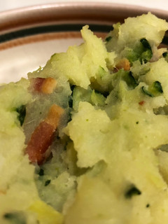Una foto de Patata con calabacín y bacon