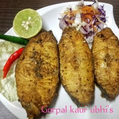 A picture of Simple Masala fried fish with Rainbow crunch salad.
