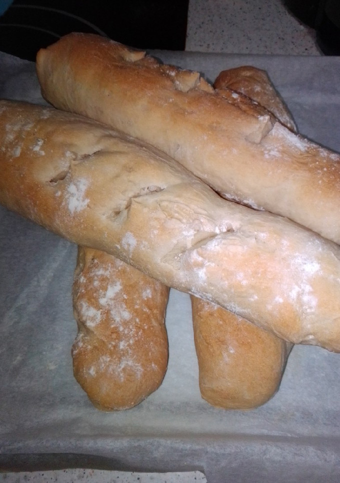 Una foto de Baguette con aceite de oliva y suero de queso