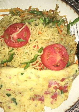 A picture of Vegetable indomie and Egg.