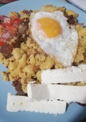 Una foto de Molido de verde con chicharrón