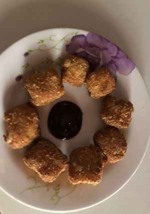 A picture of Chicken nugget and cheese.