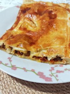 Una foto de Empanada de berenjena asada y tomate seco