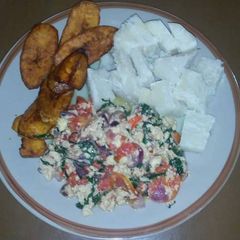 Fried plantain,voiled yam with vegetable egg sauce A picture of Fried plantain,voiled yam with vegetable egg sauce.
