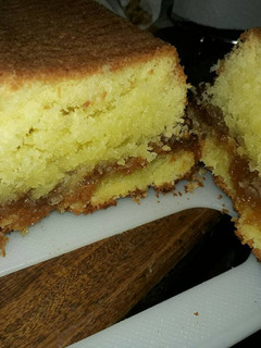 Una foto de Budín de coco y dulce de leche