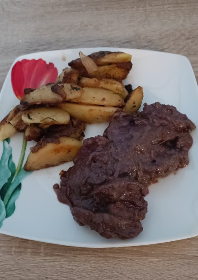 Una foto de Papas salteadas y panas de pollo