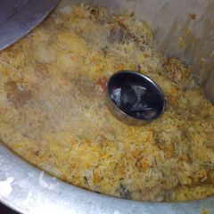 A picture of Smokey Chicken Biryani.