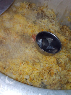 A picture of Smokey Chicken Biryani.