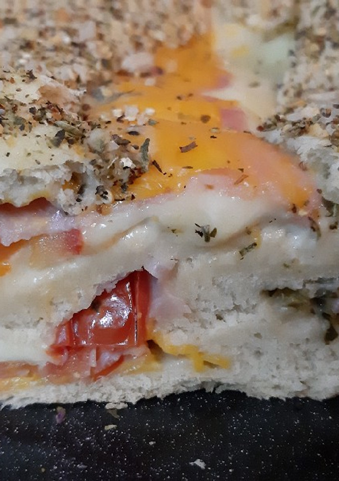 Una foto de Pizza rellena arrollada 🍕