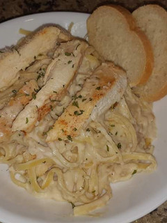 A picture of Chicken Alfredo with Homemade Sauce.