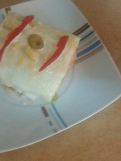 Una foto de Brazo gitano salado con pan de molde