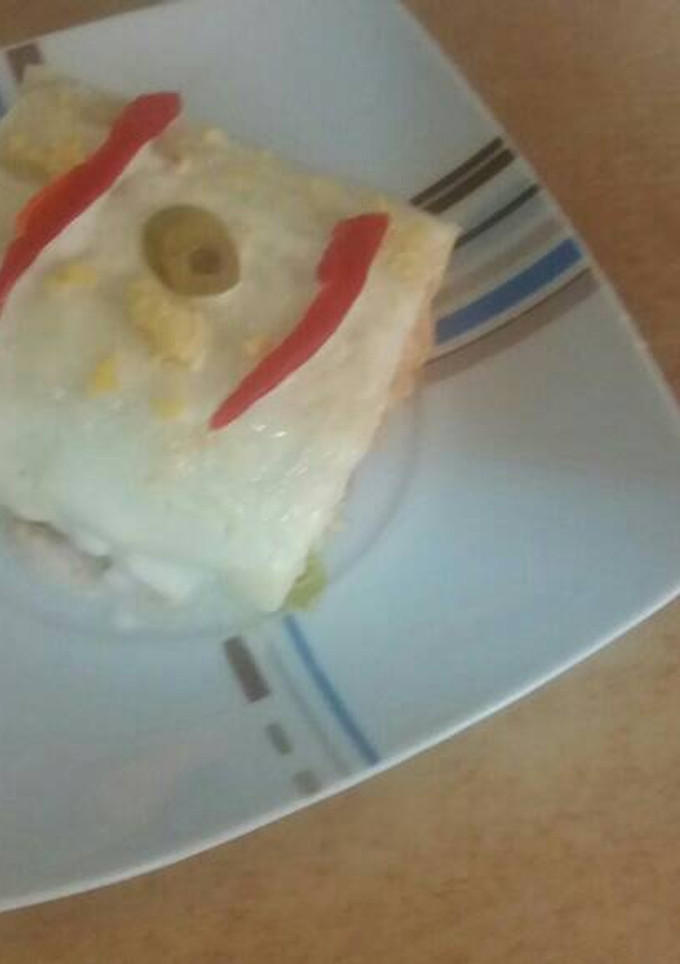 Una foto de Brazo gitano salado con pan de molde