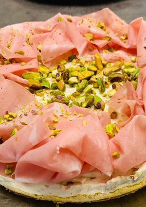 Foto di Cheesecake salata ai pistacchi e mortadella