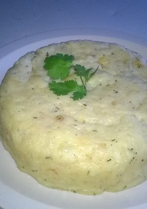 Una foto de Molde de Parmesano Patatas Y Romero