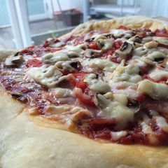 Prosciutto and Mushroom Pizza A picture of Prosciutto and Mushroom Pizza.
