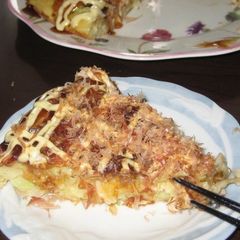 A picture of Cheese, Seafood, and Corn Pizza-Style Okonomiyaki.