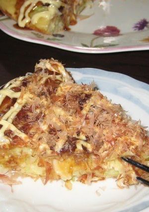 A picture of Cheese, Seafood, and Corn Pizza-Style Okonomiyaki.