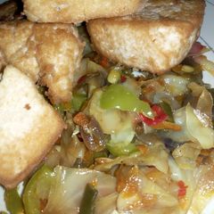 A picture of Tofu (Awara) with veggies.