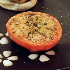 A picture of low calorie baked parmasean tomatoes.