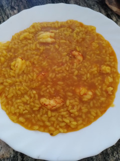 Una foto de Arroz meloso de gambones