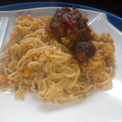 Indomie and chicken A picture of Indomie and chicken.