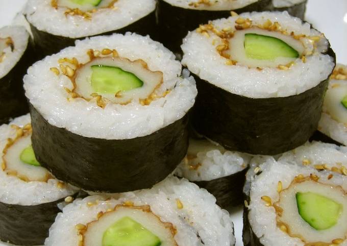 Sushi Chef Making Roll Sushi With Cucumber And Egg Stock Photo, Picture and  Royalty Free Image. Image 131623657.