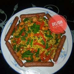 Stir-fried curry noodles and sausages A picture of Stir-fried curry noodles and sausages.