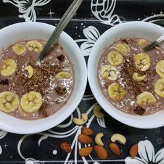 A picture of Dark Chocolate Almond Pumpkin and Chia Seeds Oats with Banana.